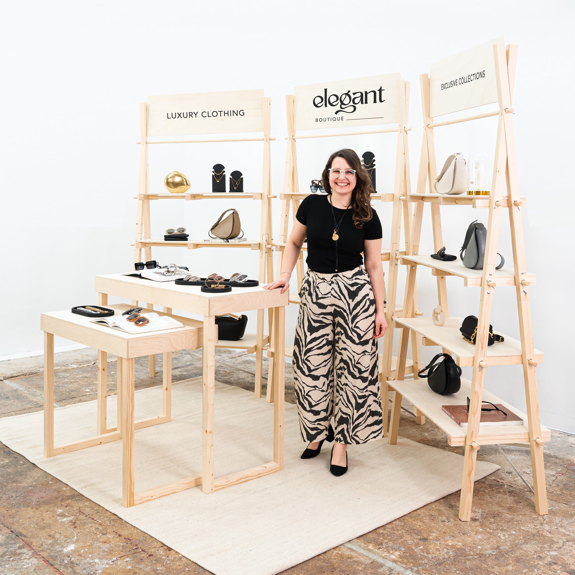 Wooden retail display with shelving units and tables