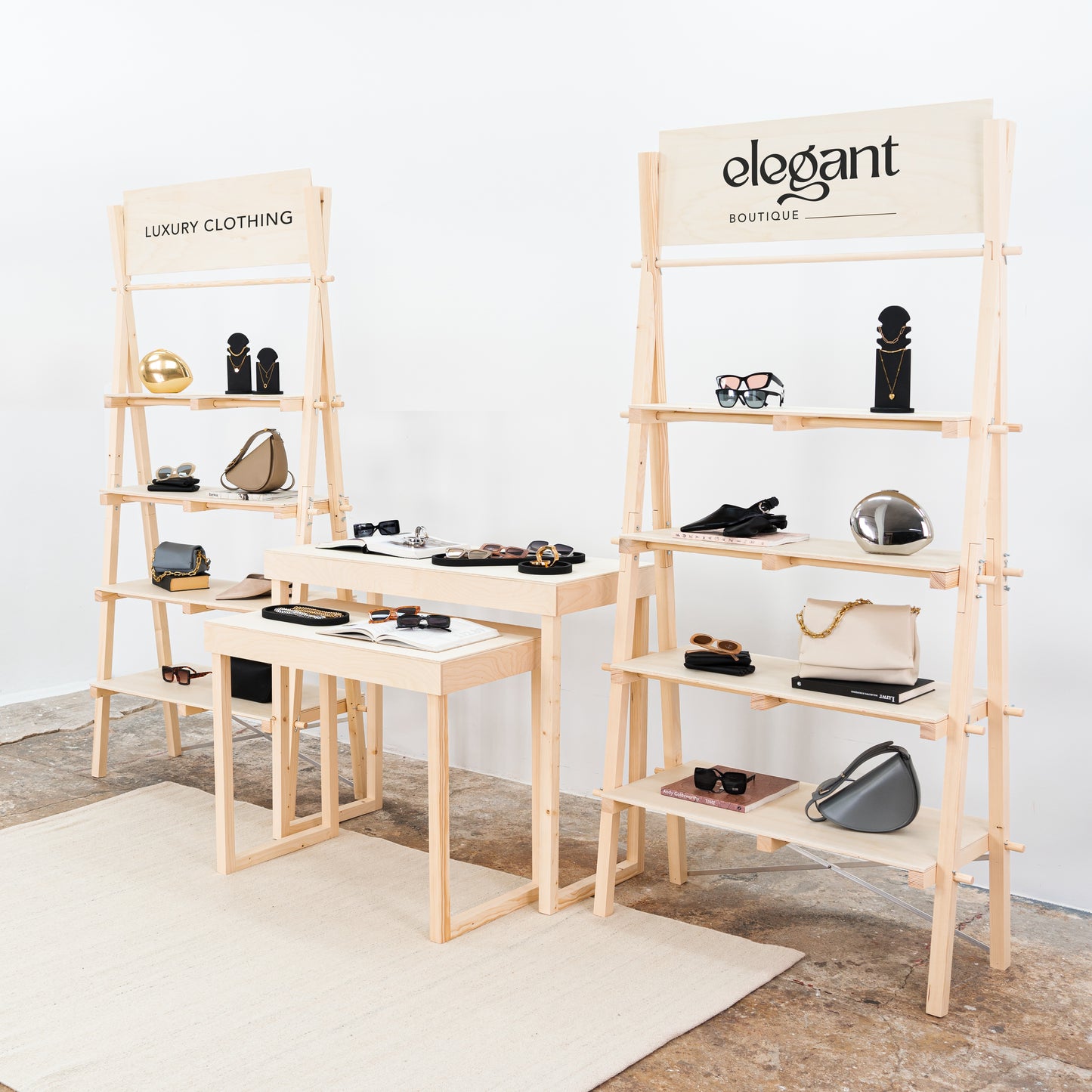 Custom booth with nesting tables and ladder shelves