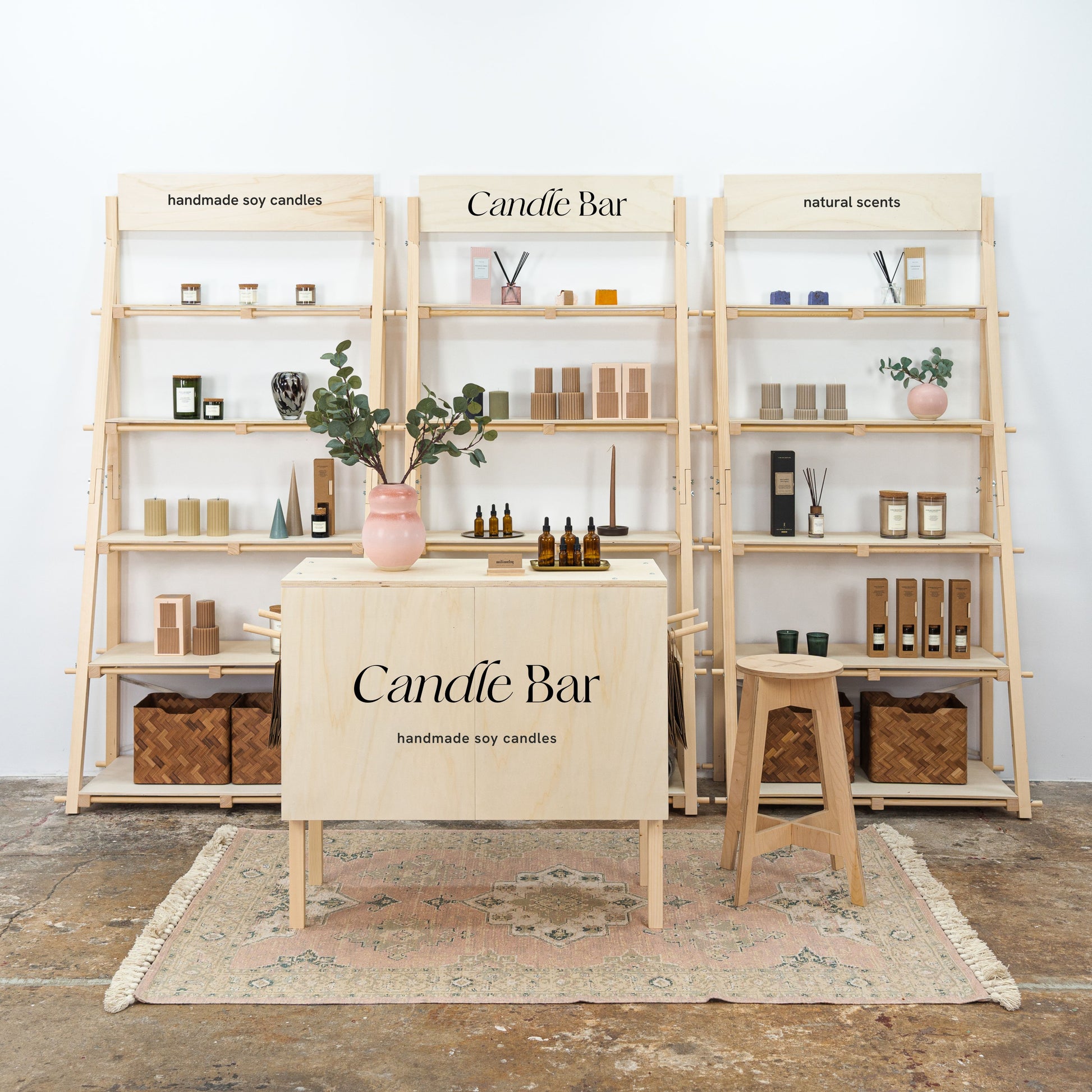 Modular retail display booth with checkout counter and shelves