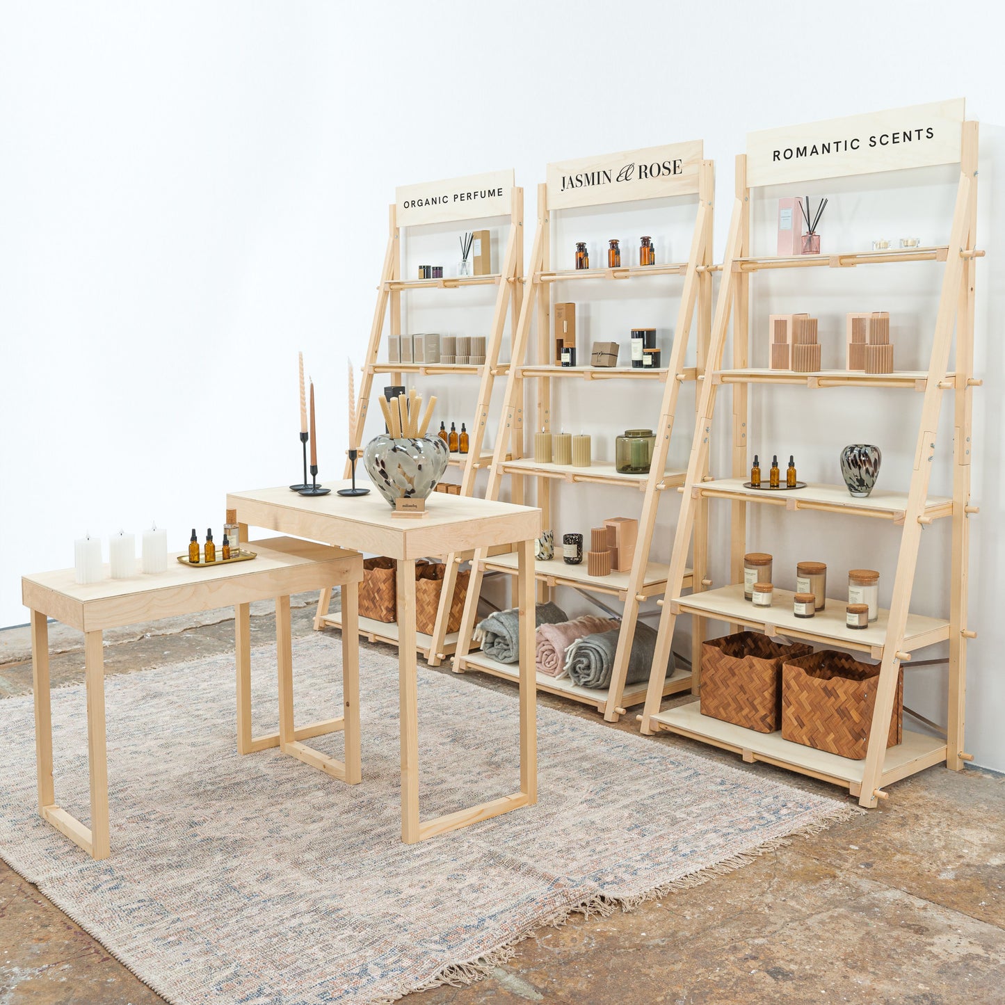 Retail booth setup with custom counter and stool