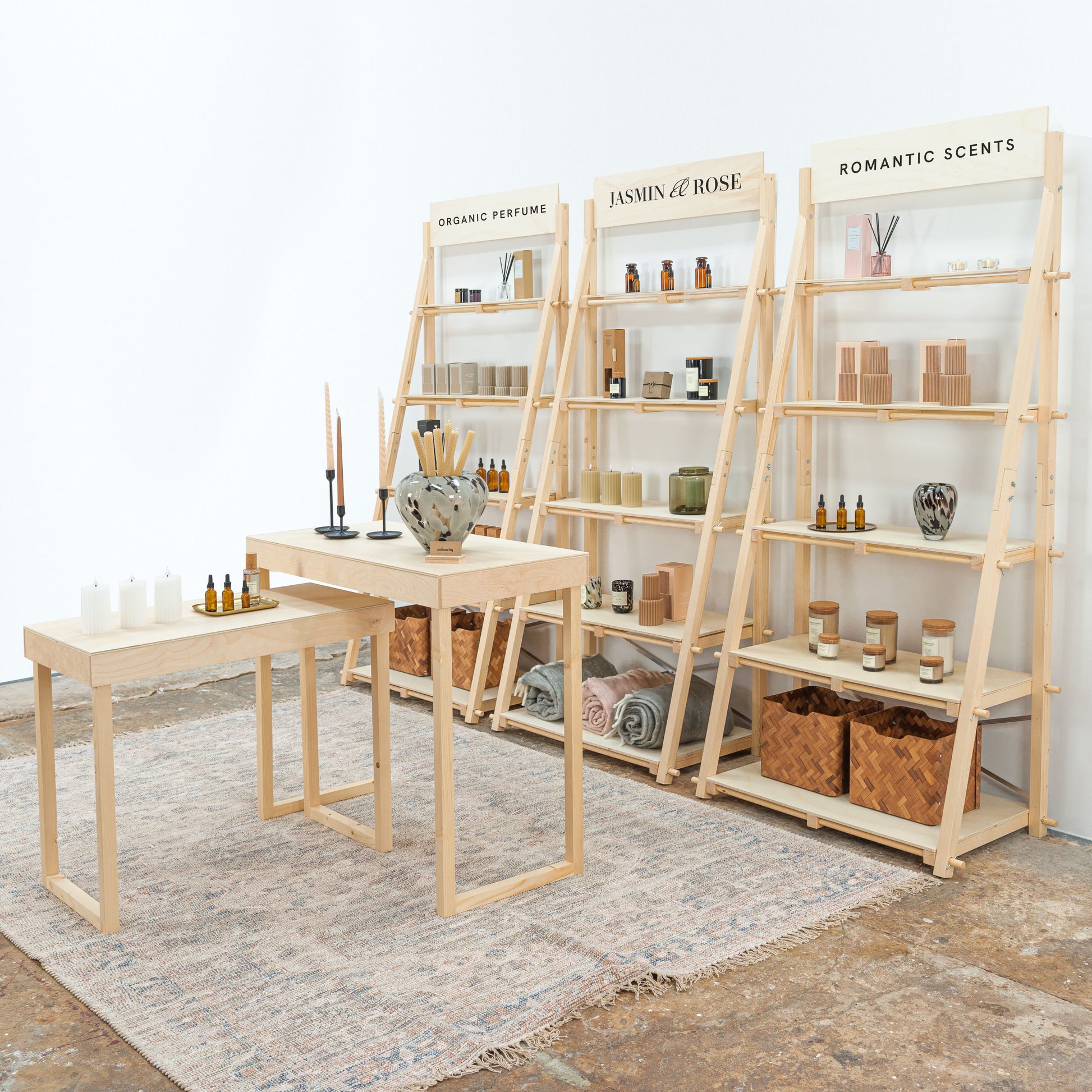 Retail booth setup with custom counter and stool