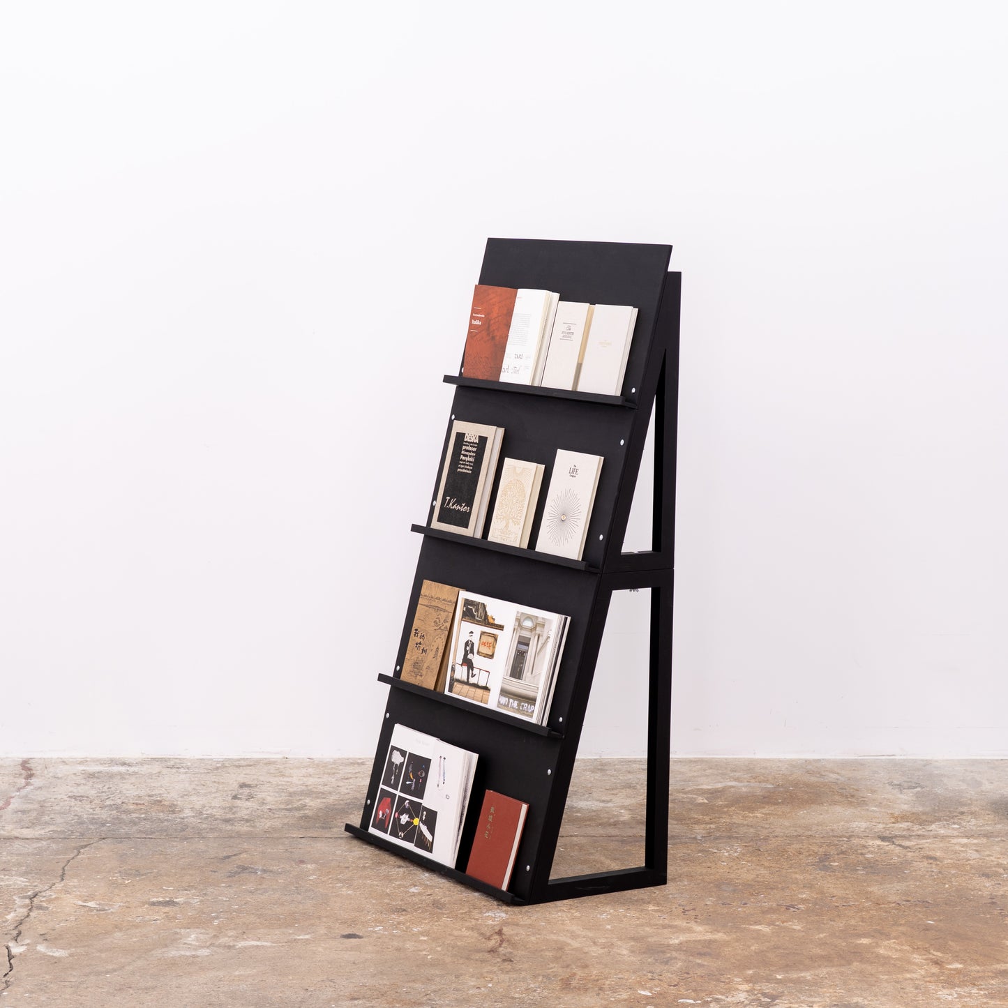 Modular magazine holder styled for a temporary retail environment
