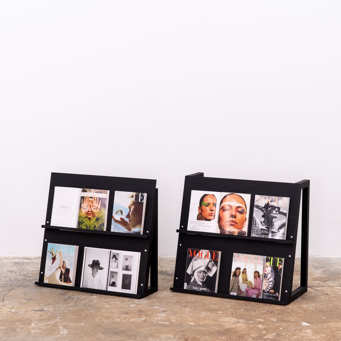 Natural wood display stand separated into two compact single-sided units for flexible use