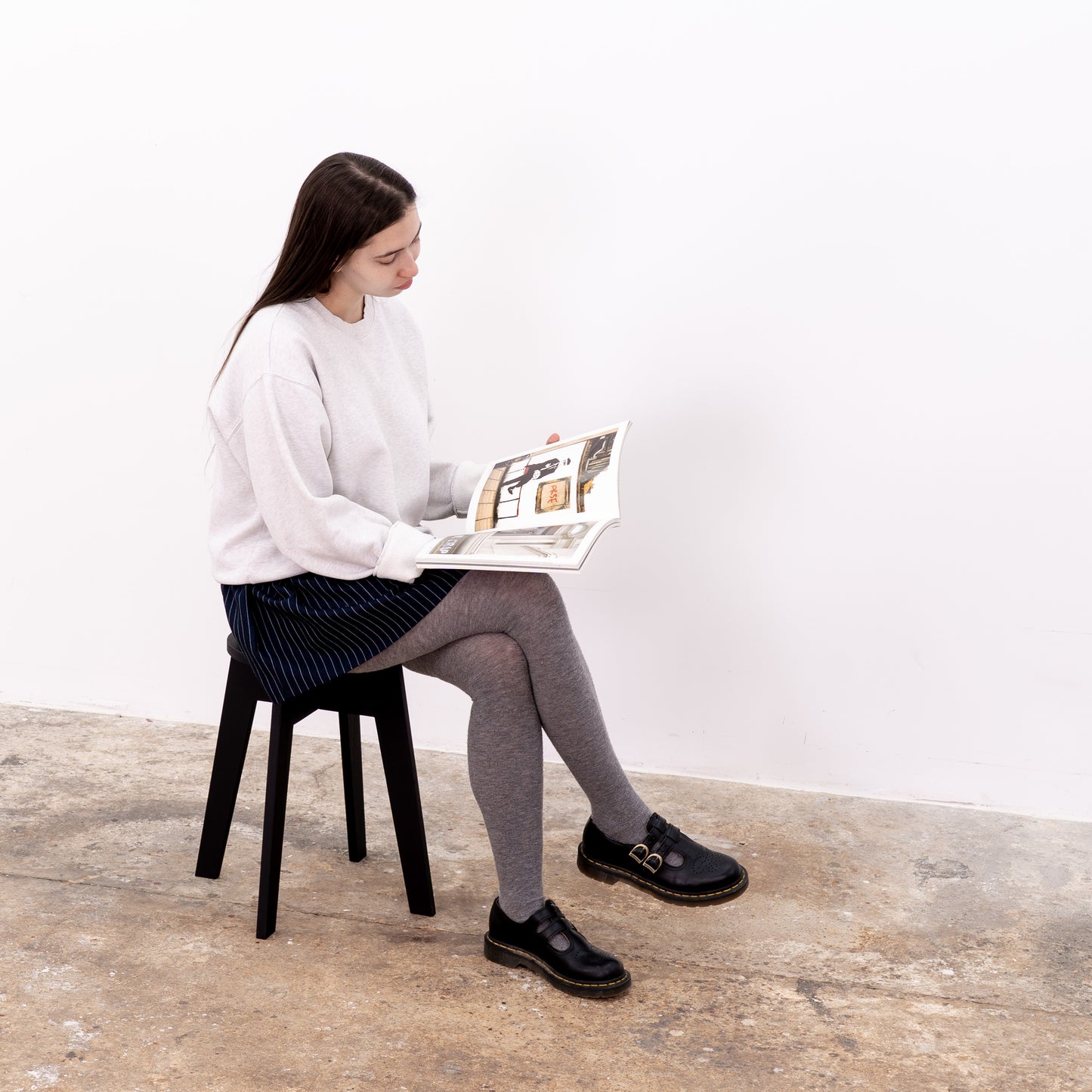Foldable black wooden stool – 45 cm height for studio and retail