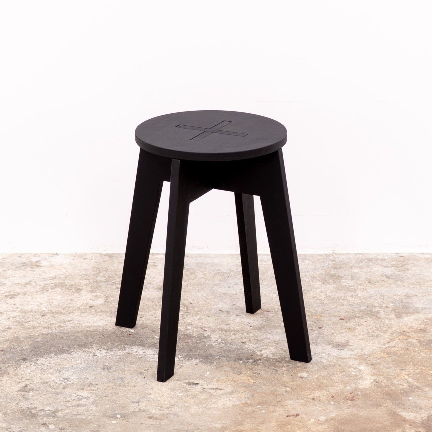 Black folding stool for fairs, counters, or creative workspaces