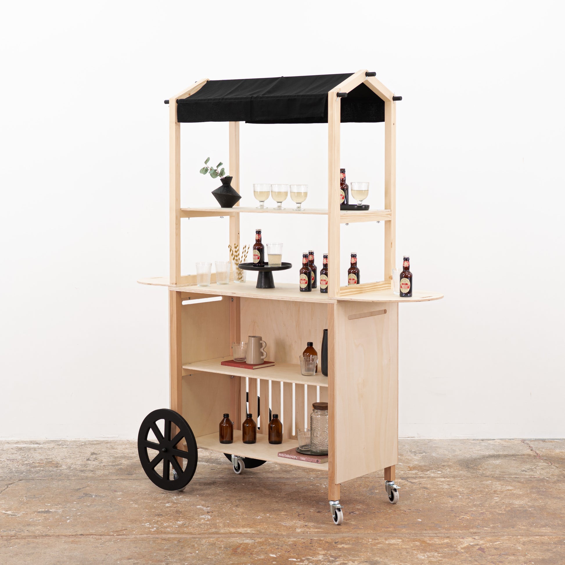 Collapsible vendor cart made of plywood and spruce wood