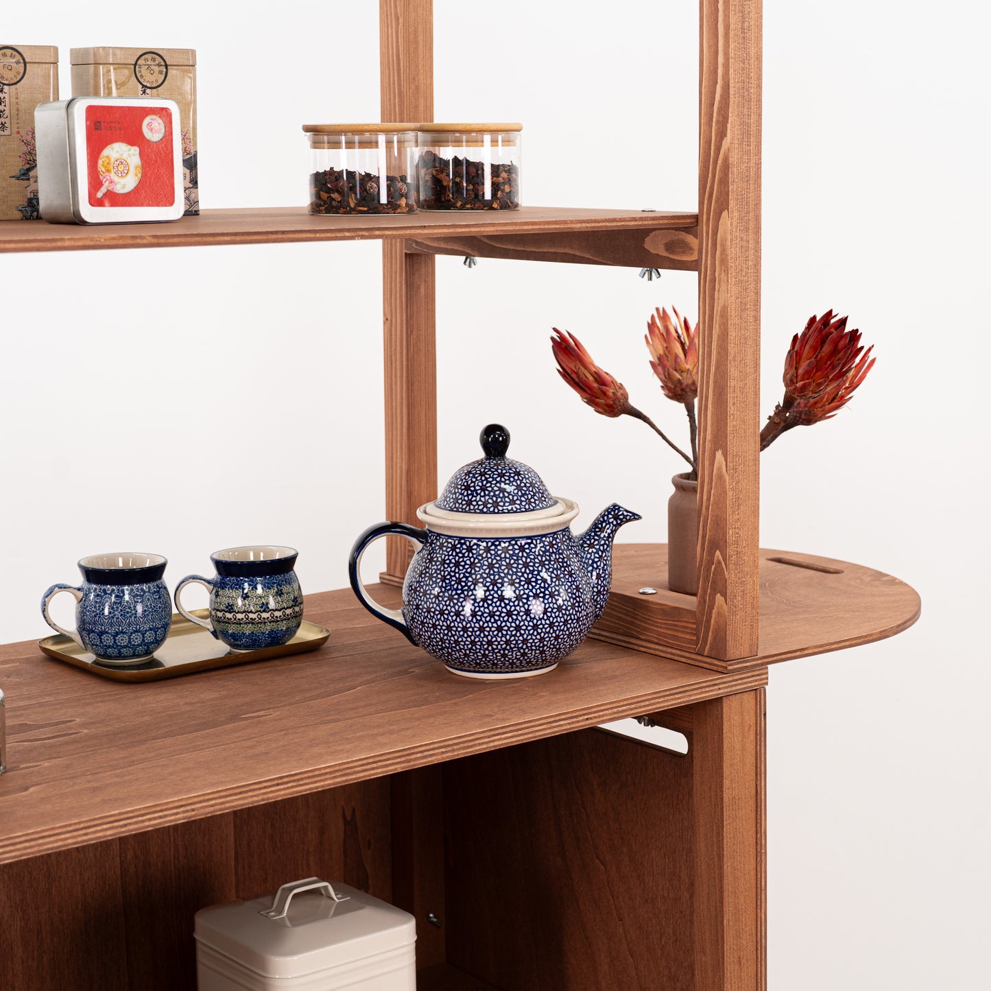 Portable dark wood booth with display shelving