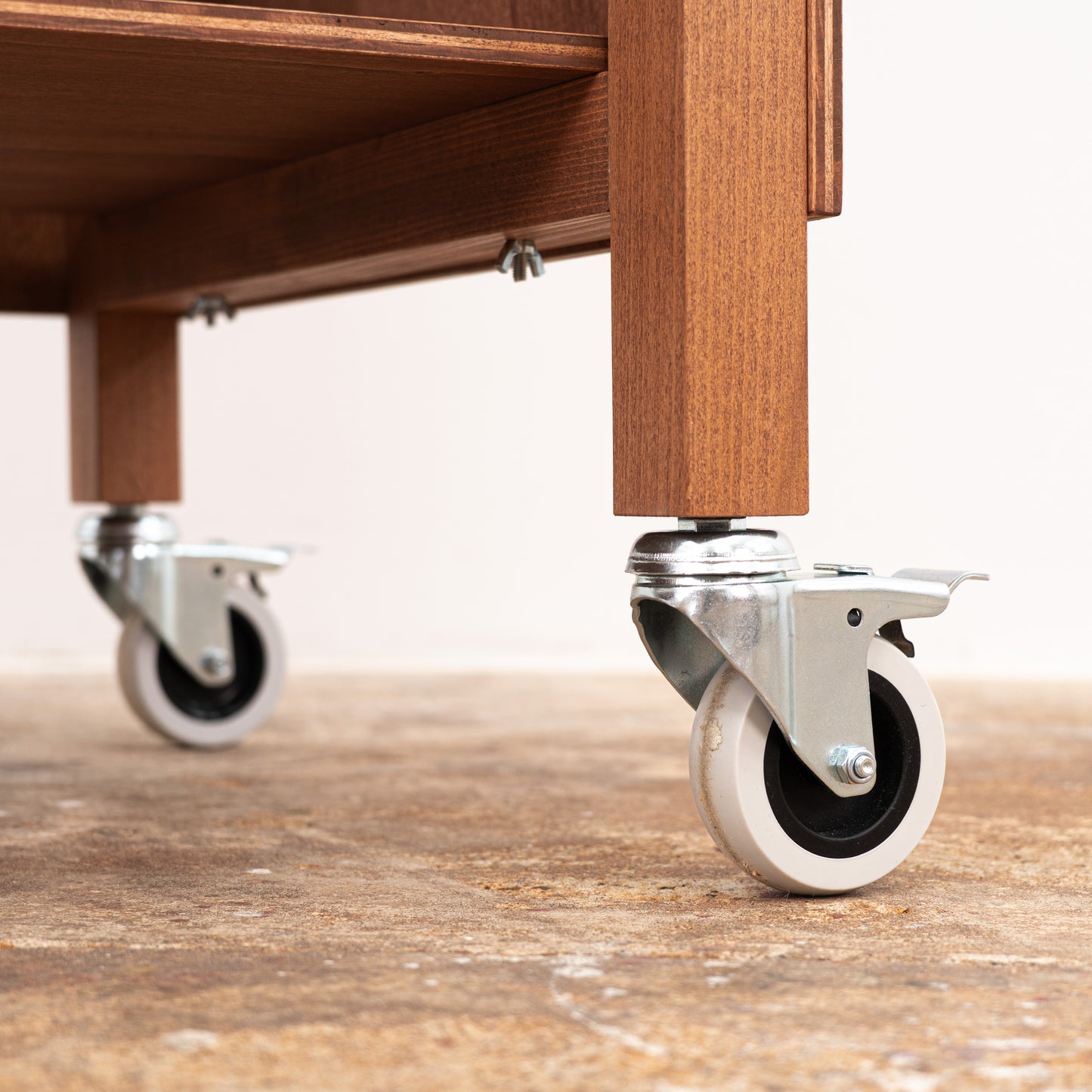 Branded dark wood pop-up cart for high-end product presentations