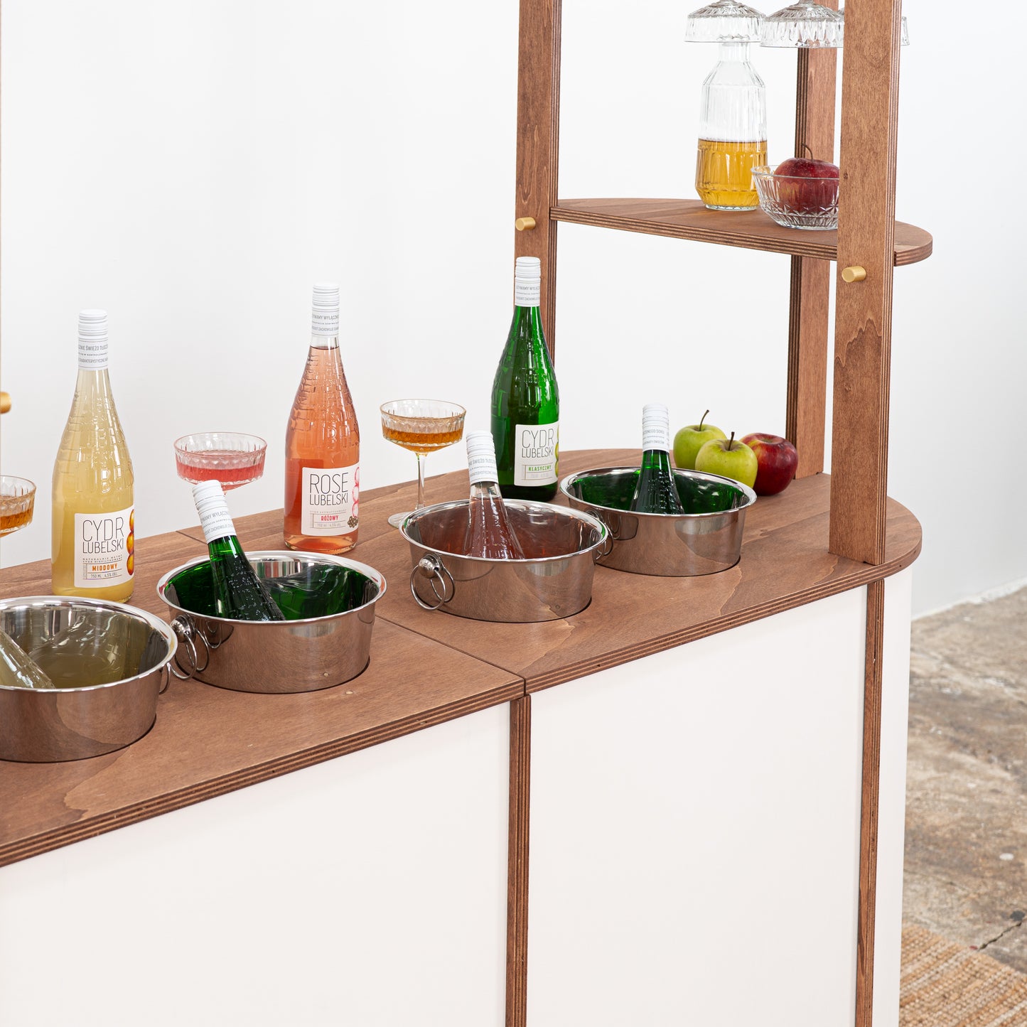 Customizable beverage cart with built-in cooler spaces, perfect for outdoor events and drink stations.