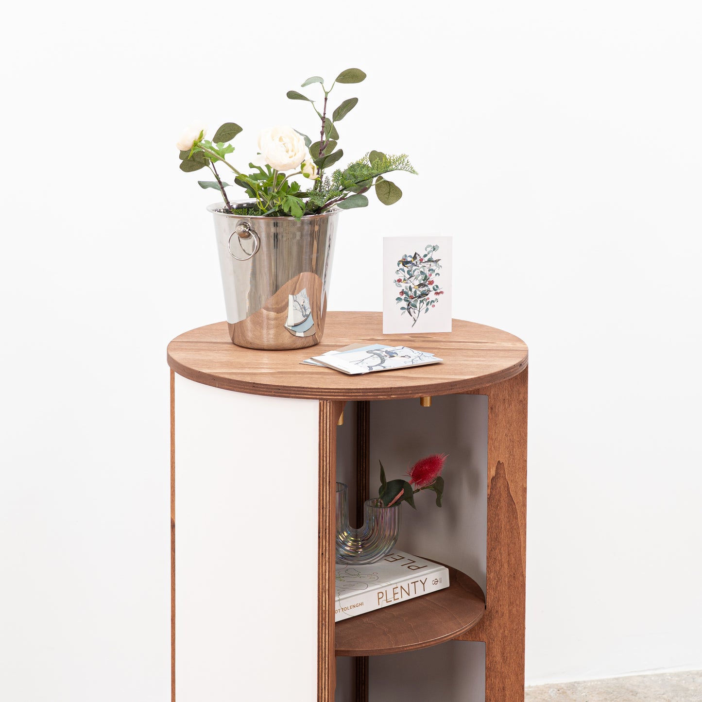 Wooden round host stand with modern design and lower shelf storage, perfect for organizing items and displaying products at exhibitions.