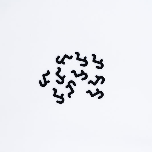 Set of 10 short hooks in black, designed for pegboards, perfect for displaying accessories, small products, and merchandise in an organized manner.