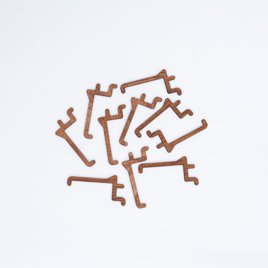 Set of 10 long hooks in Coffe color for pegboards, ideal for displaying items such as bags and accessories.