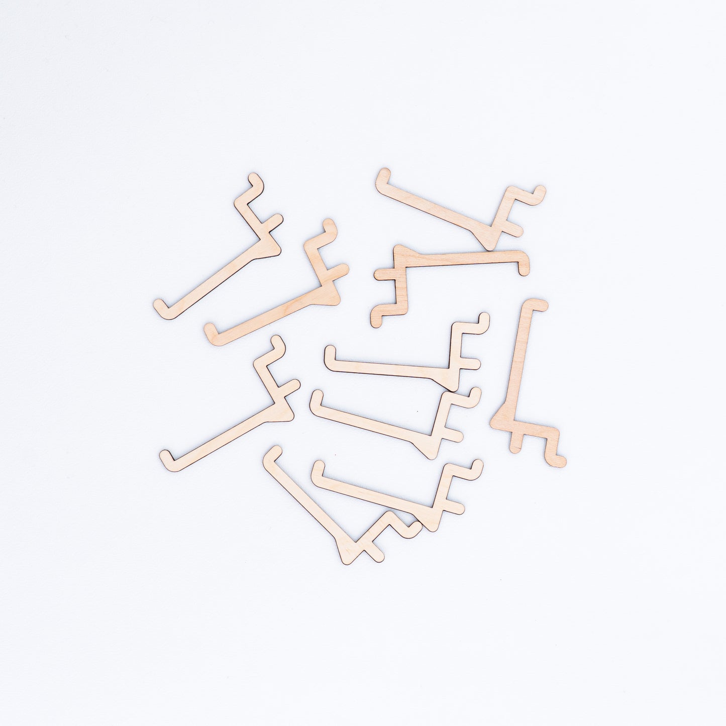 Set of 10 long hooks designed for freestanding and tabletop pegboards, perfect for organizing and displaying large merchandise at events and shops.