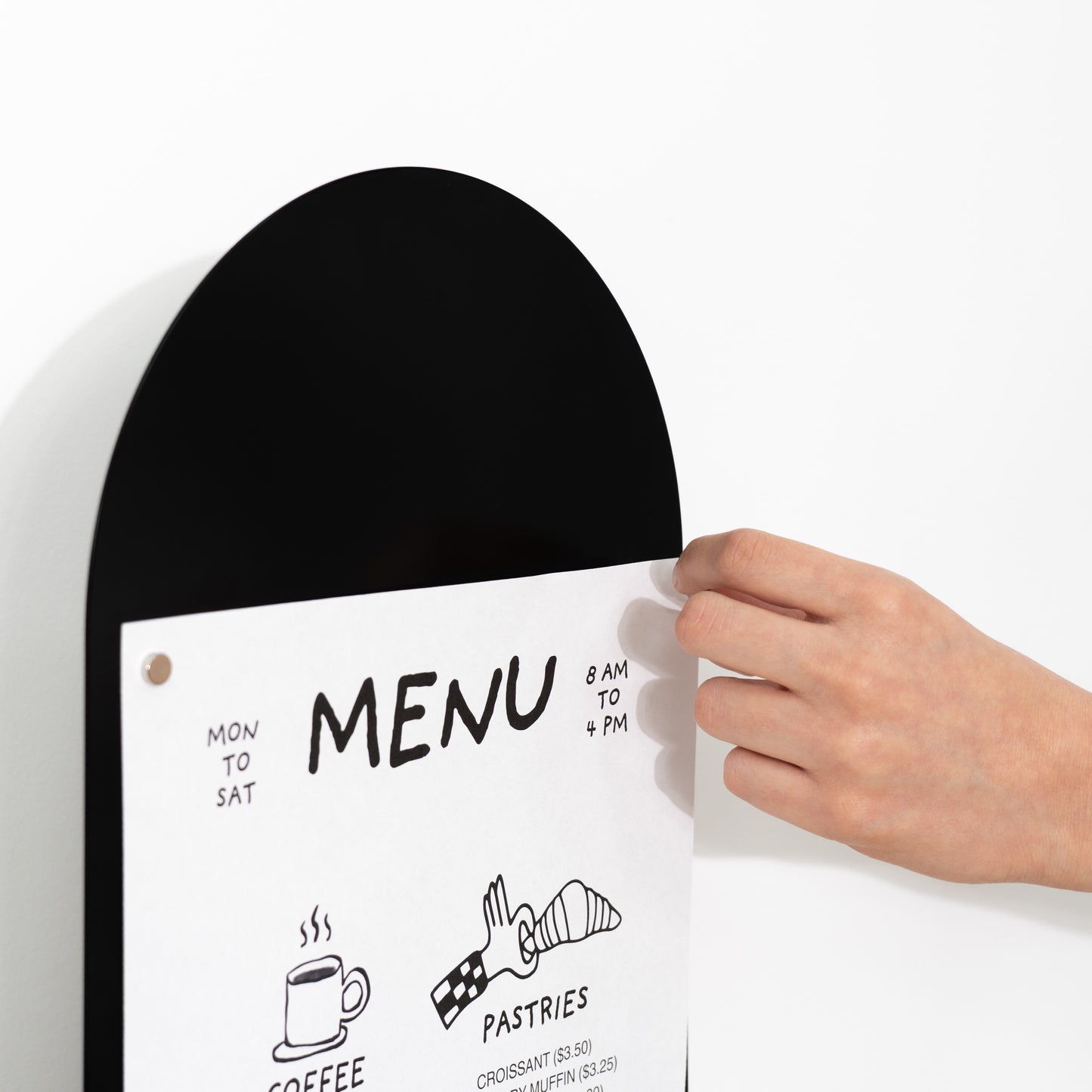 Freestanding black vertical board with magnets and wood base