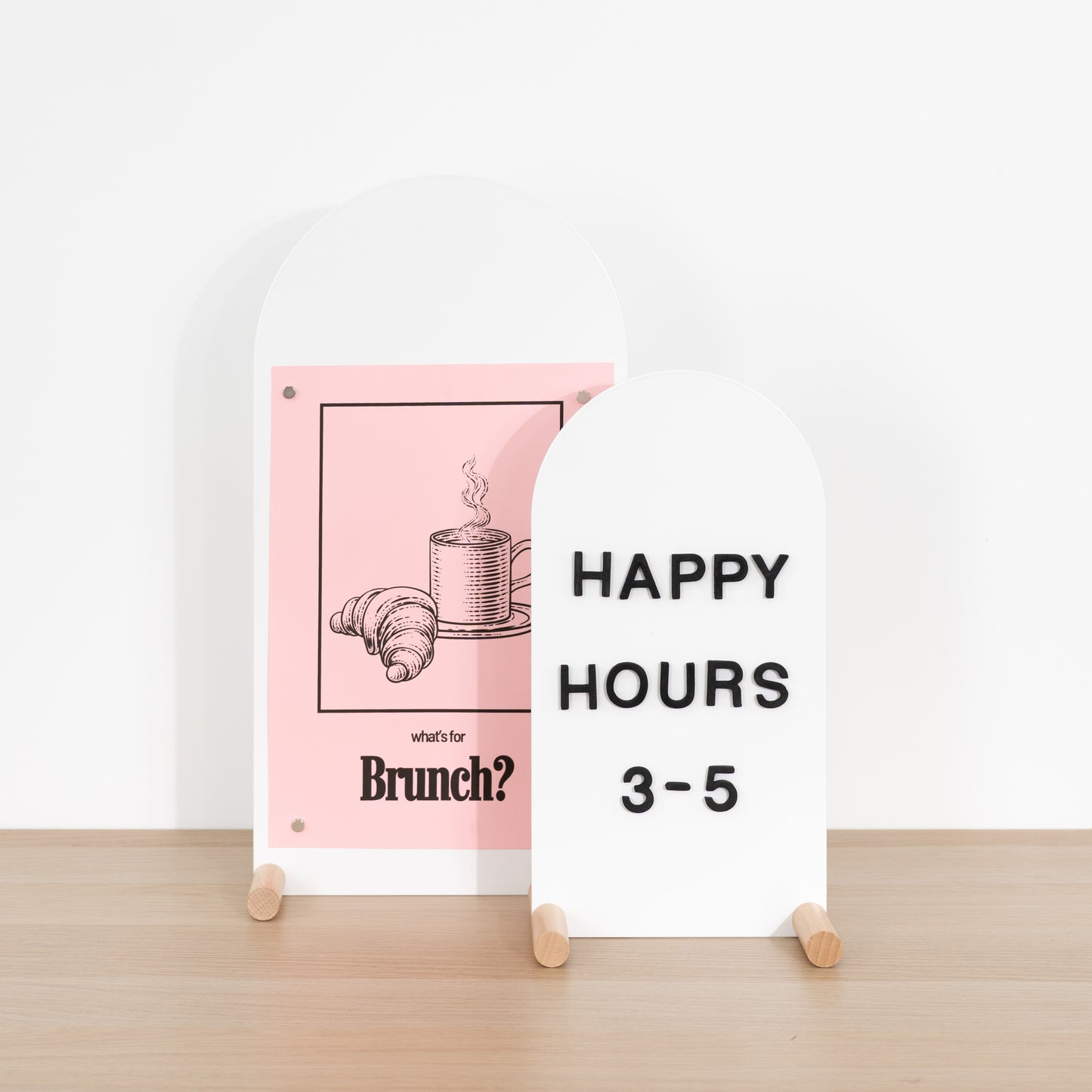 Vertical magnetic tabletop sign with black text and natural wood feet