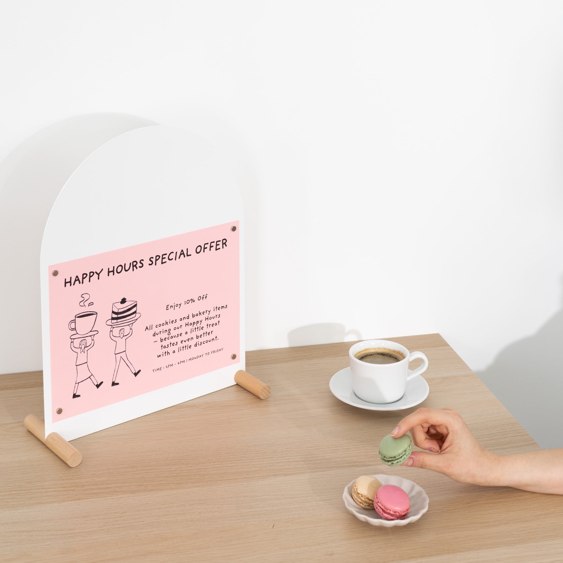 Clean white tabletop sign with promotional print