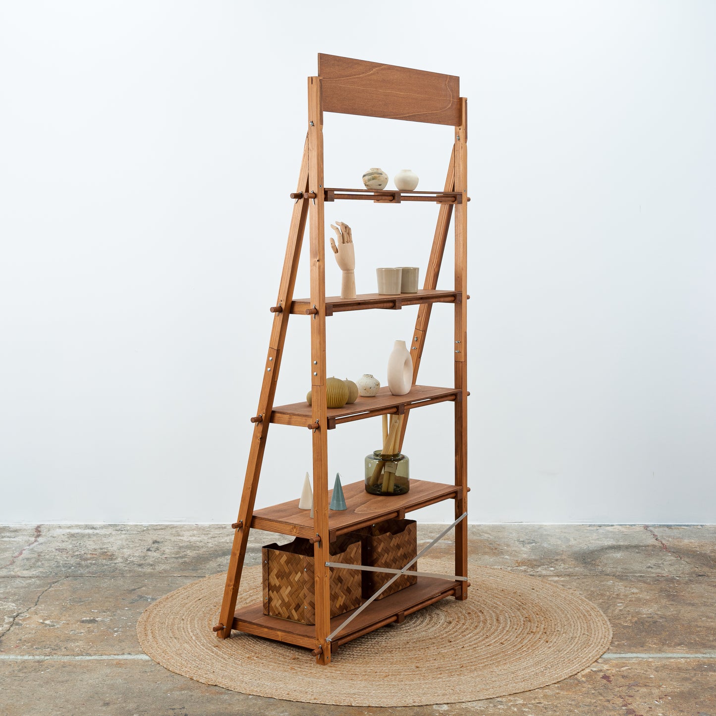 Wooden shelving unit for trade shows in warm brown finish