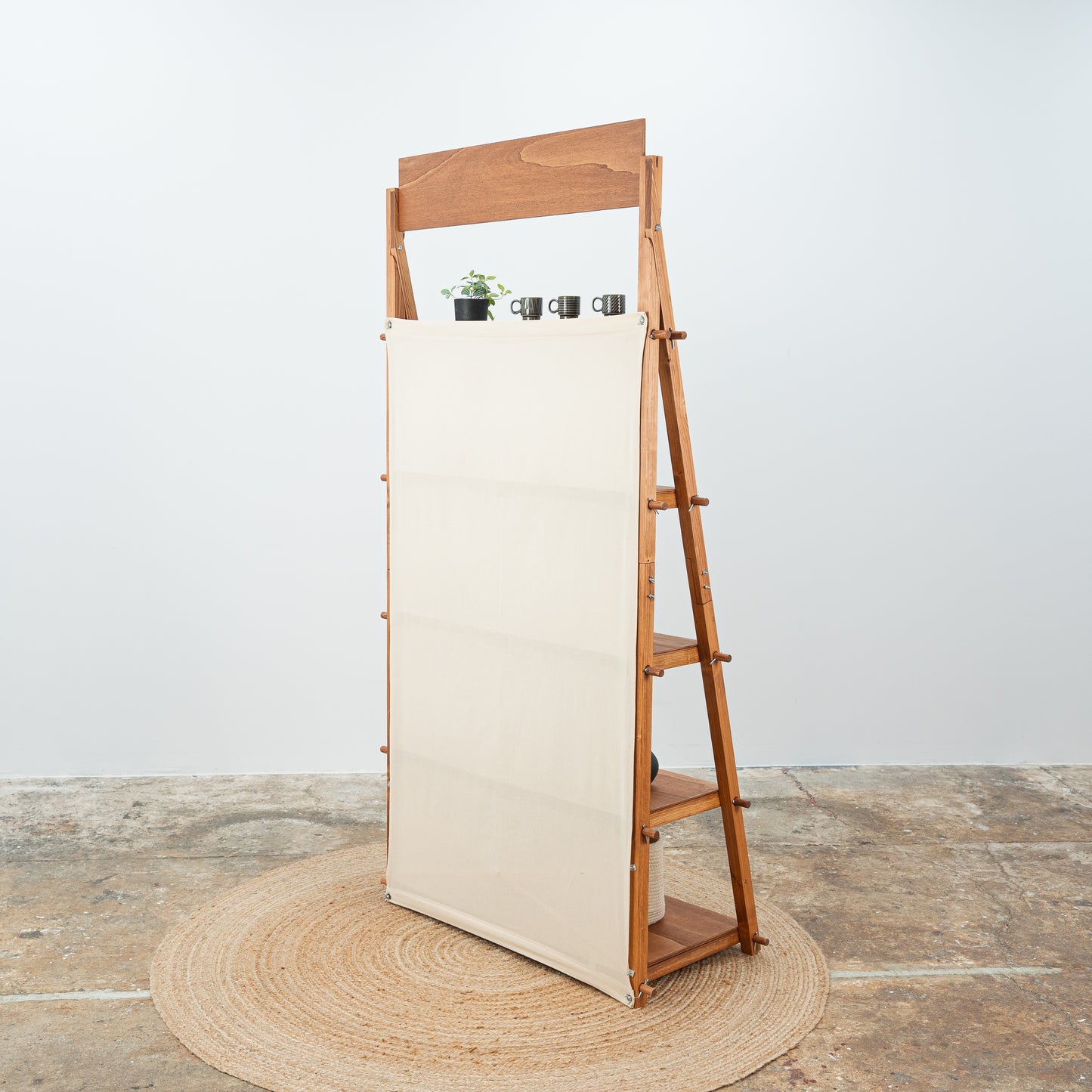 Stylish collapsible shelves in brown wood finish for artisan displays