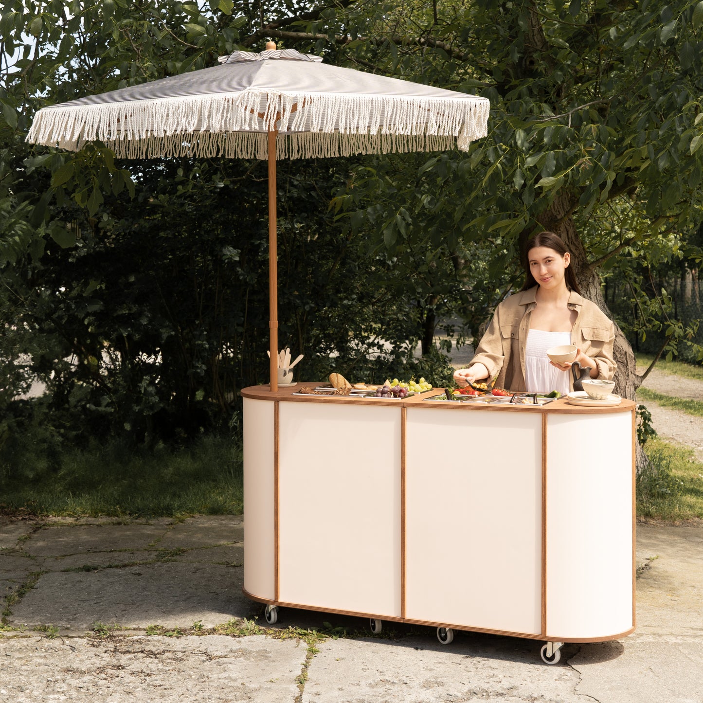 Snack station with drink and food display setup outdoors