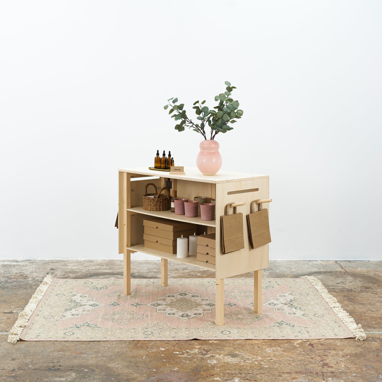 Natural finish portable counter with bag hooks