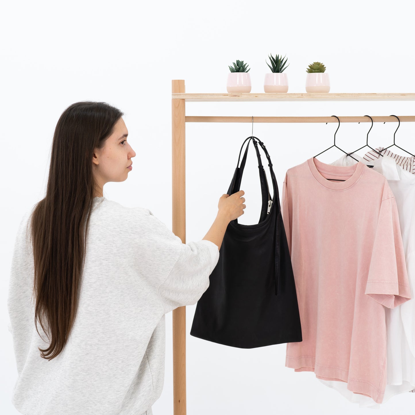 Lightweight wooden modular garment rack with lockable wheels for retail activations