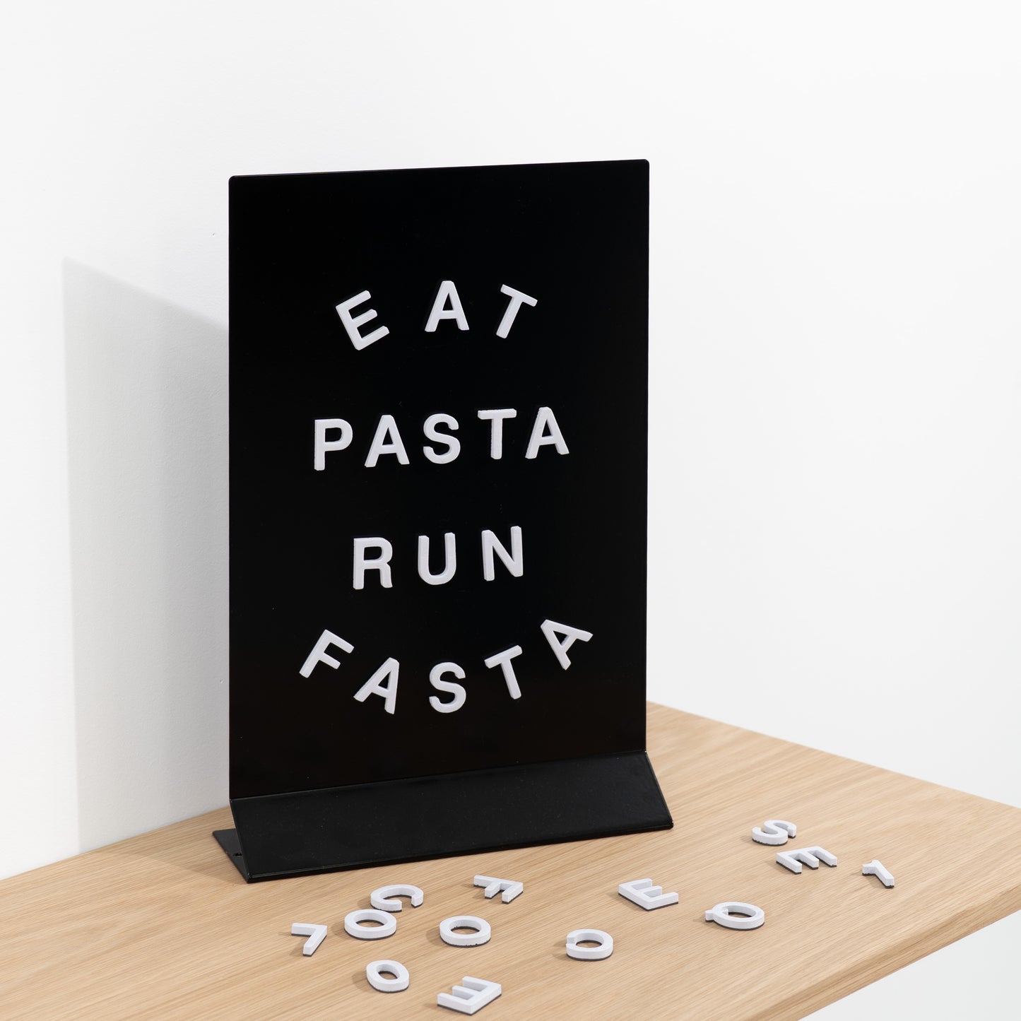 Sleek black rectangular menu board with magnetic surface for promotions and branding