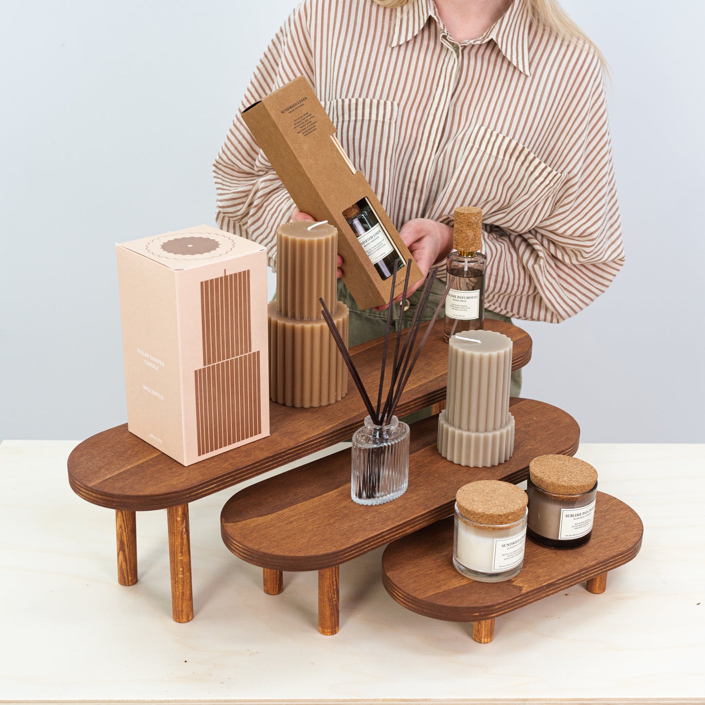 Stylish wooden riser set in coffee finish for premium retail spaces