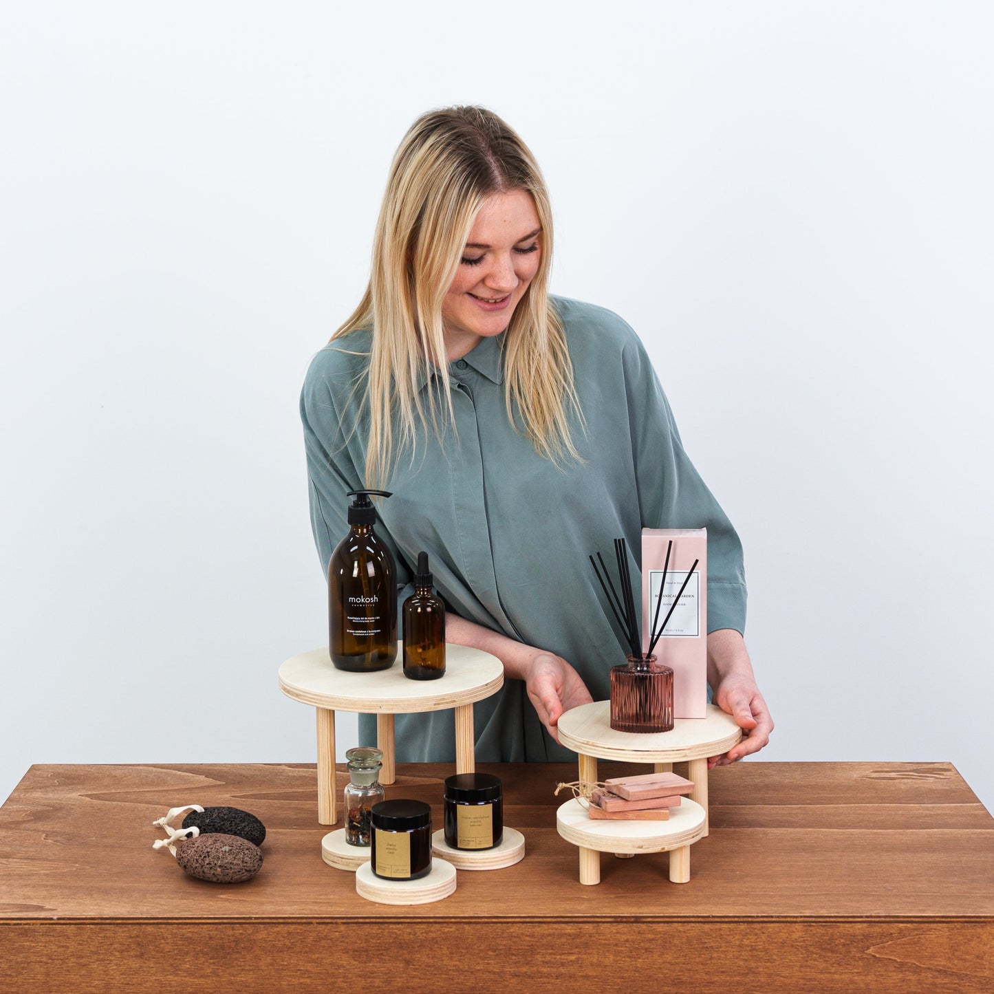 portable riser and coaster set for showcasing skincare and ceramics