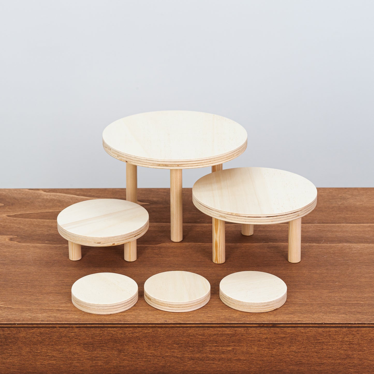minimalist natural plywood risers for retail product presentations