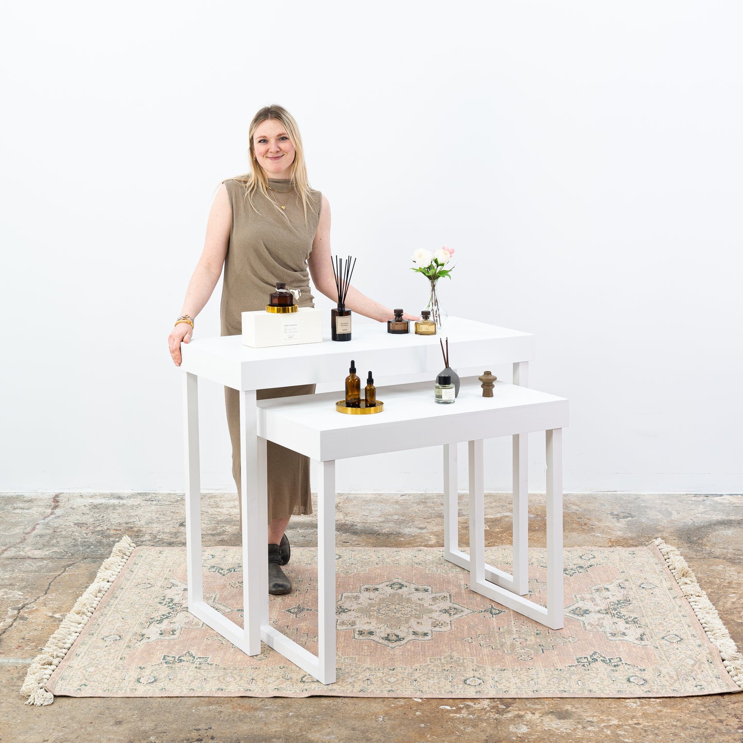 Market booth furniture with sleek white finish and compact storage