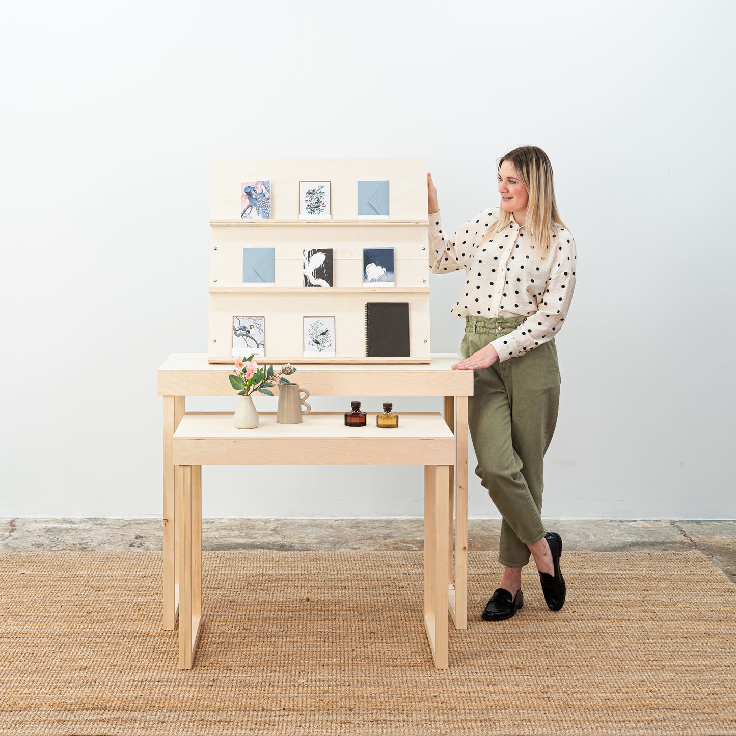 foldable tabletop retail stand in natural finish