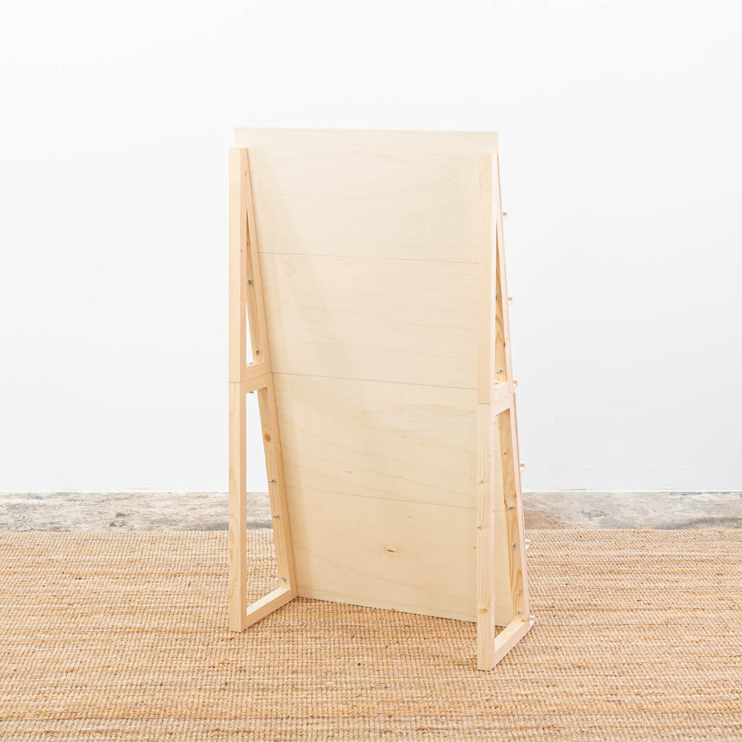 Display unit showcasing minimal stationery in natural tones