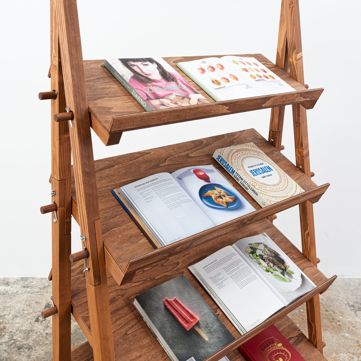 Coffee brown collapsible display furniture with branded panel