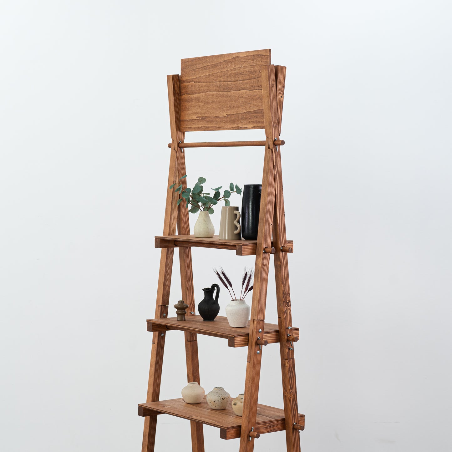 A-frame stand with angled shelves designed for trade show booths