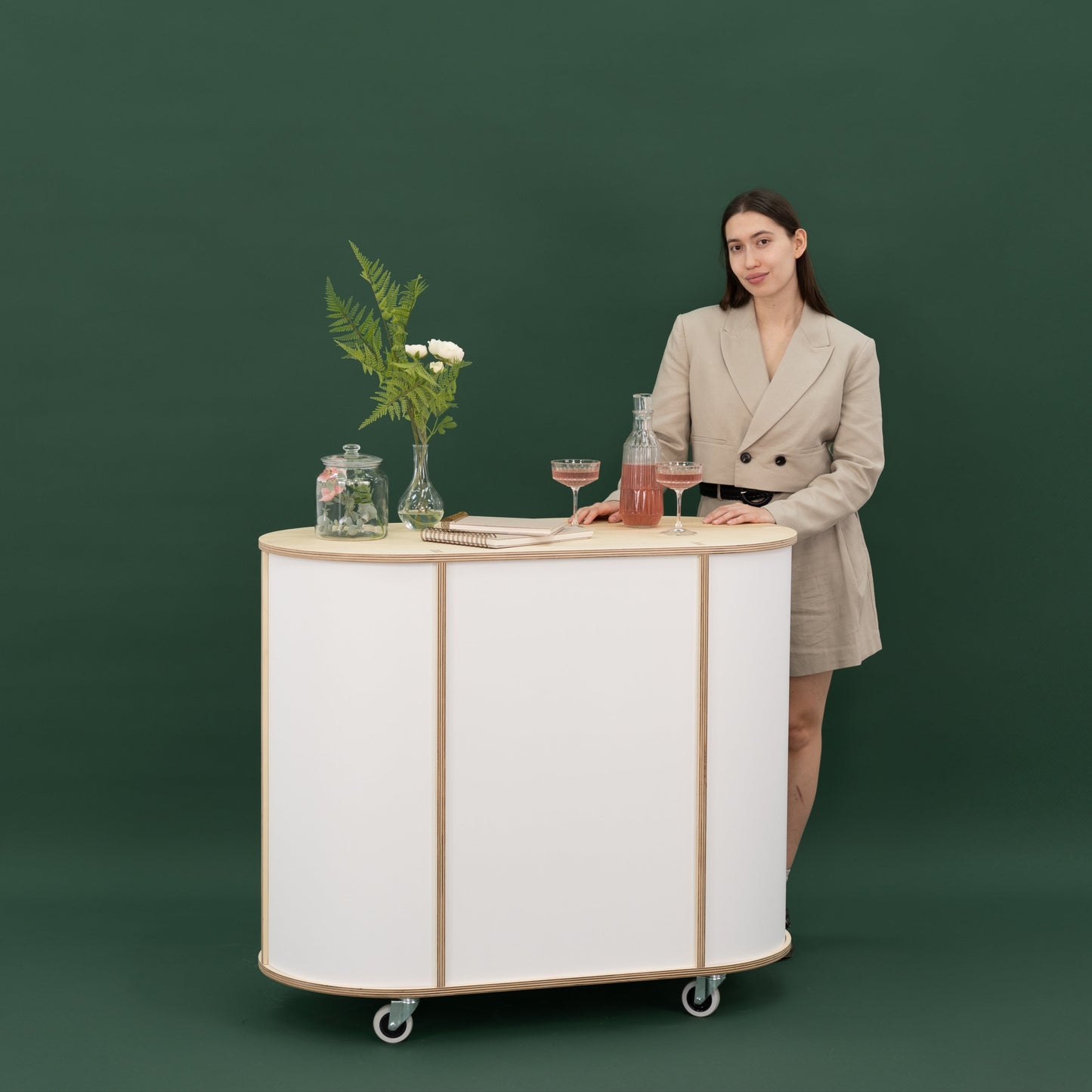 Mobile and customizable oval display counter in a modern setup.