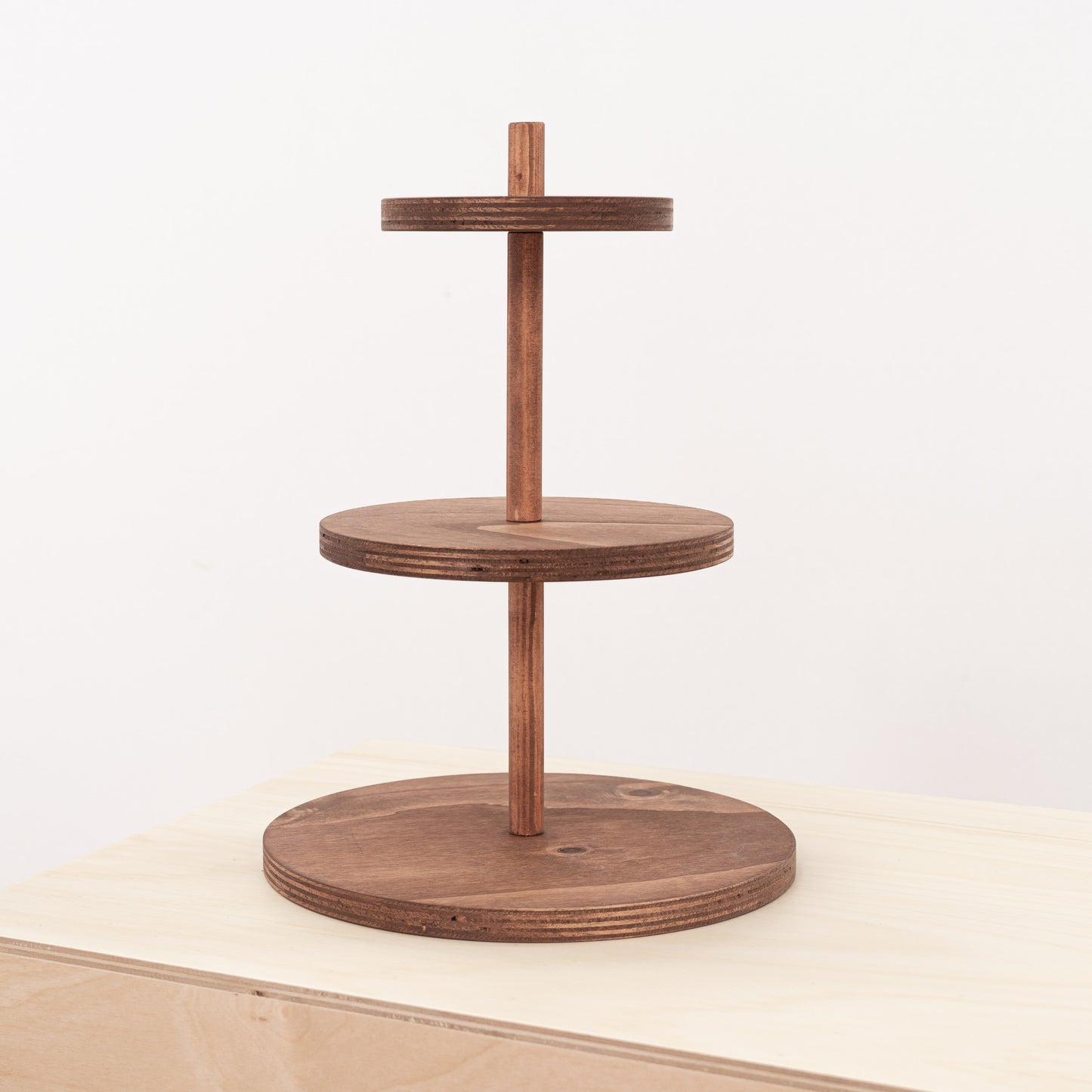 Elegant coffee color three-tier riser with detailed measurements for a modern and luxurious product presentation.