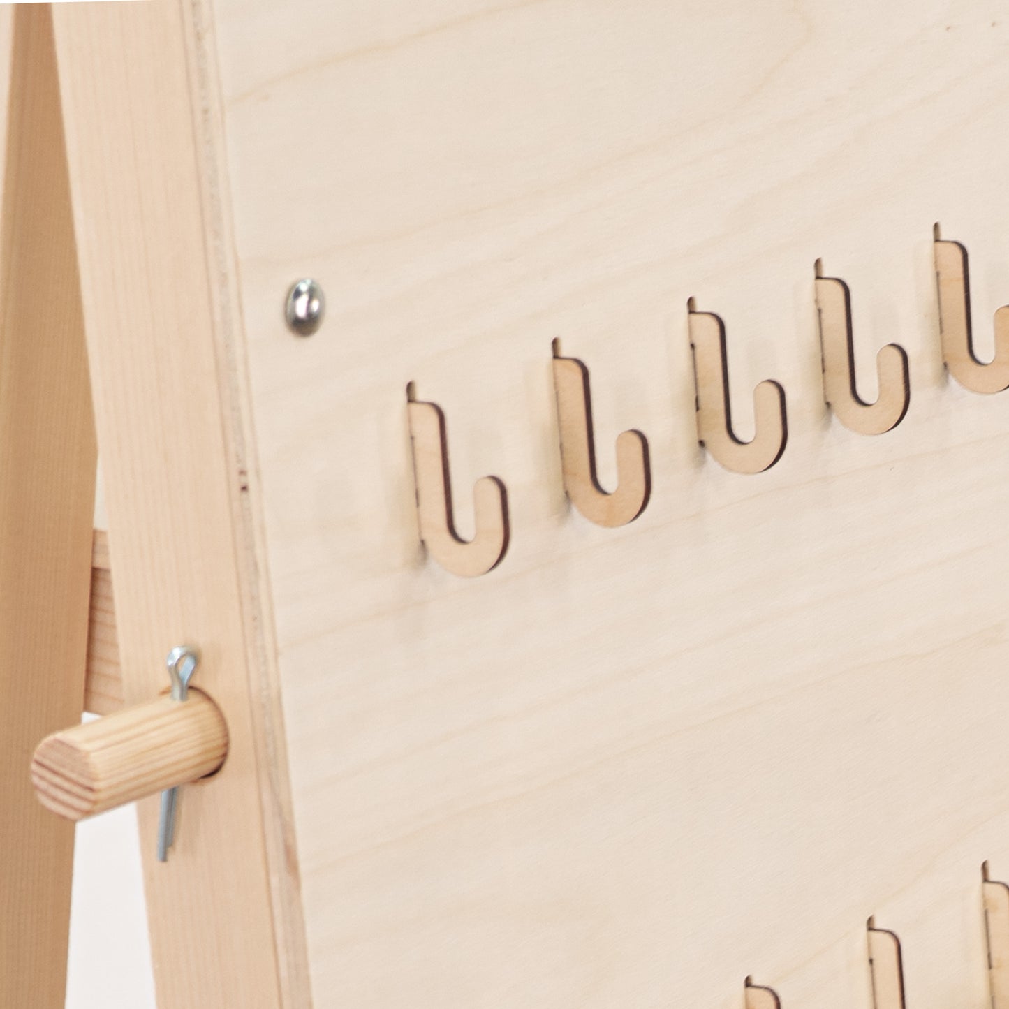 Pack of 10 short hooks for pegboards, perfect for hanging small items in trade shows, pop-up shops, and retail spaces.