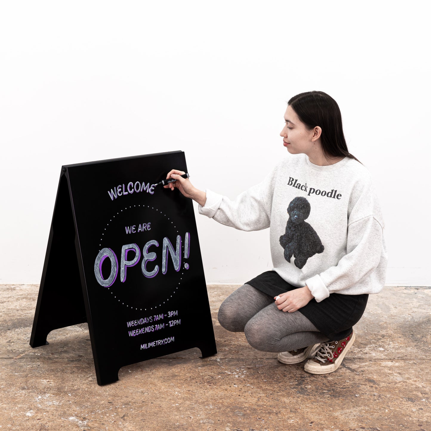 Outdoor black A-frame advertising sign