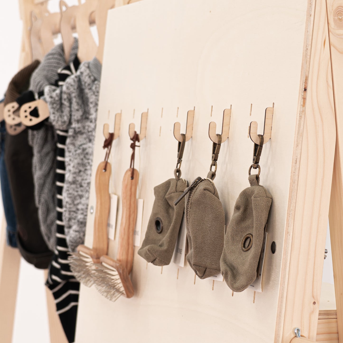 Wooden short hooks for pegboards, ideal for use in tabletop and large freestanding pegboards to display merchandise.