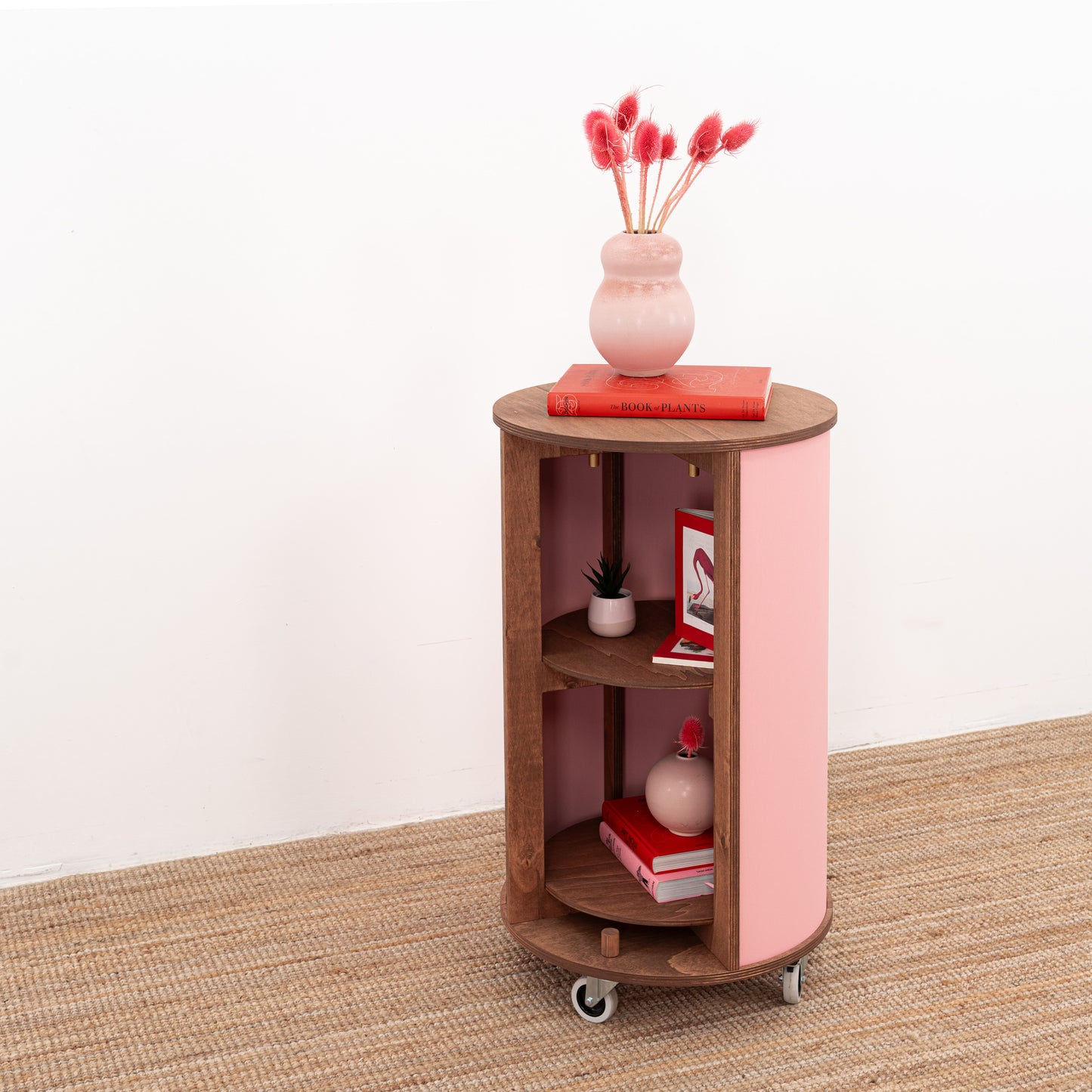 Round host stand with modern design, offering customizable features and ample storage space for events and product displays.