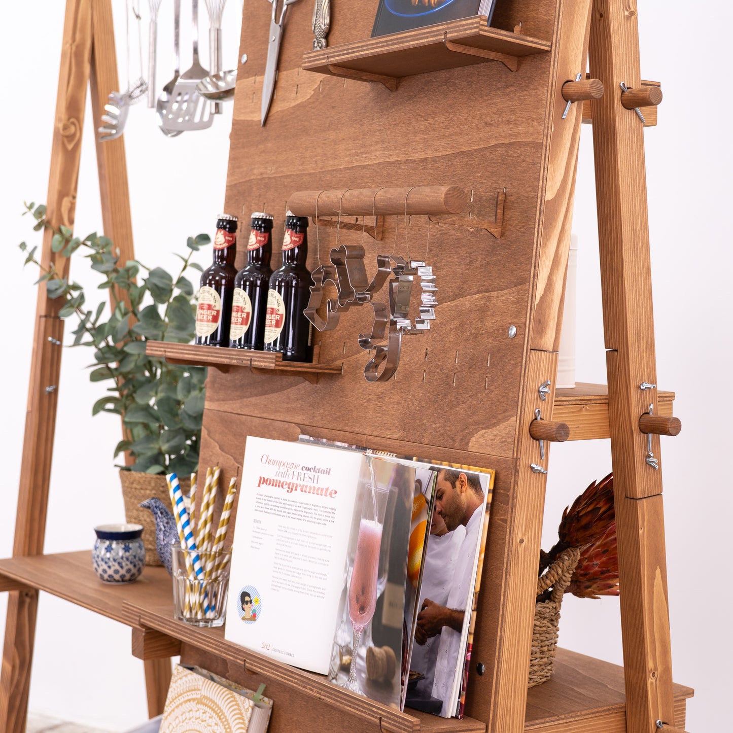 Lifestyle display stand with dual surfaces and branded top panels