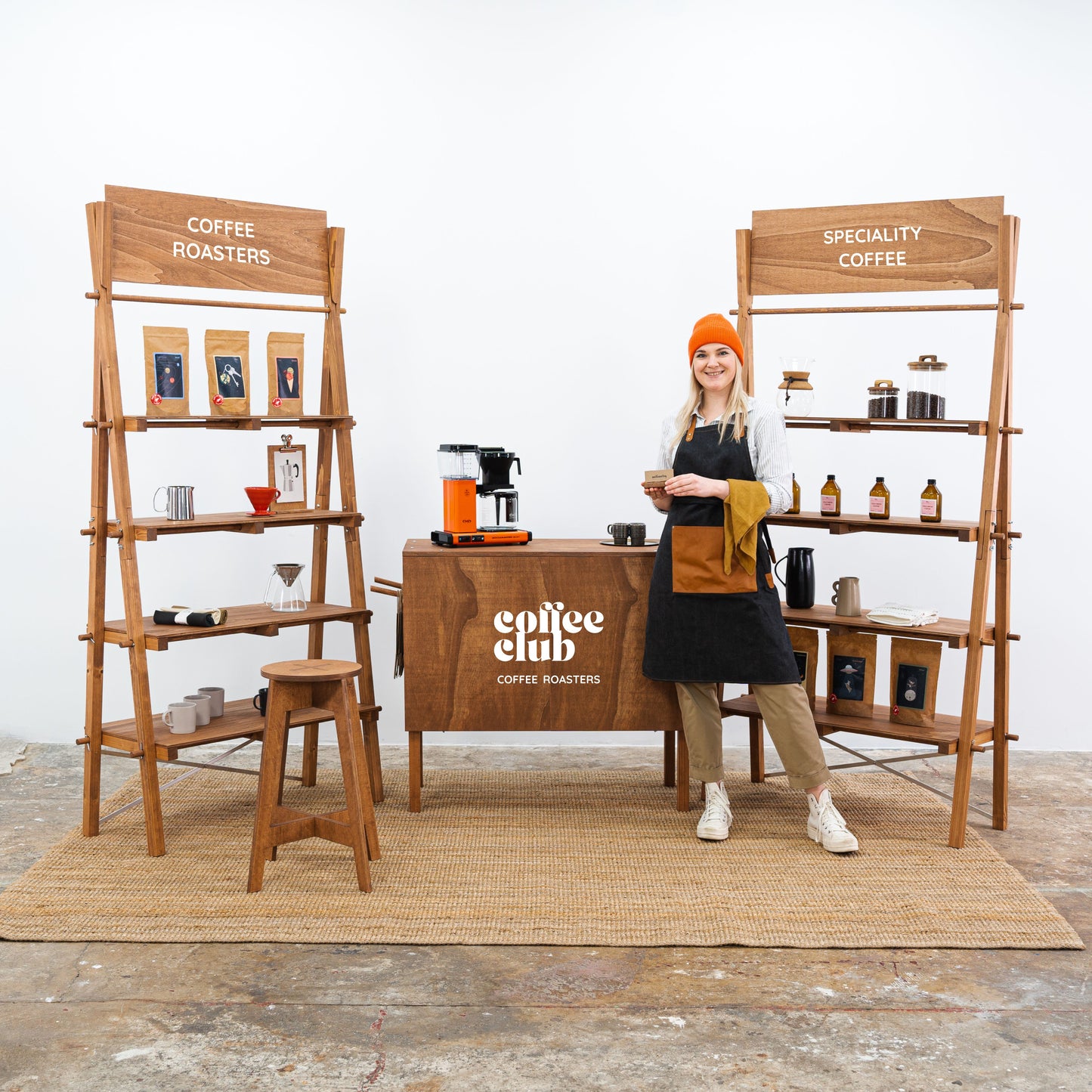 Display shelves and checkout station for retail booths