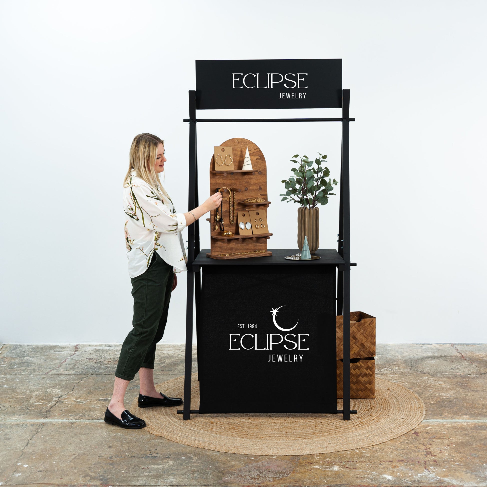 Display stand with fabric front panel customized with brand logo