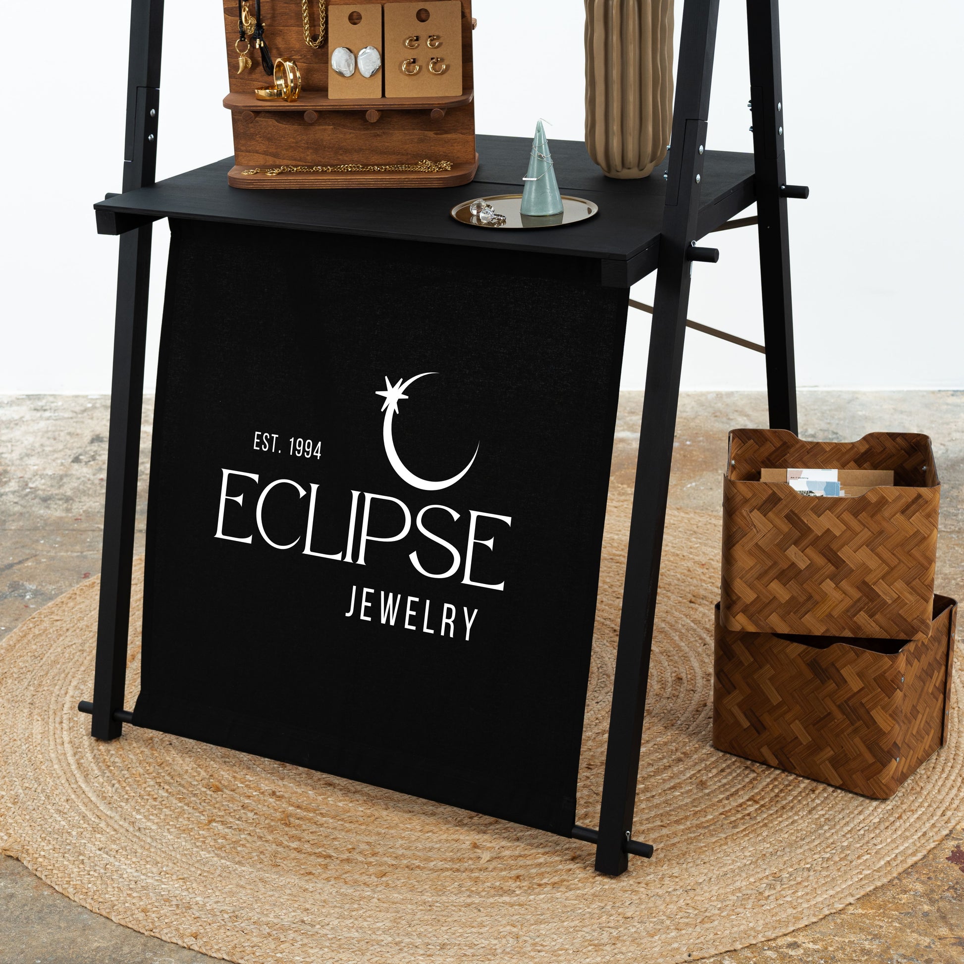 Portable market booth setup with custom graphics on front panel