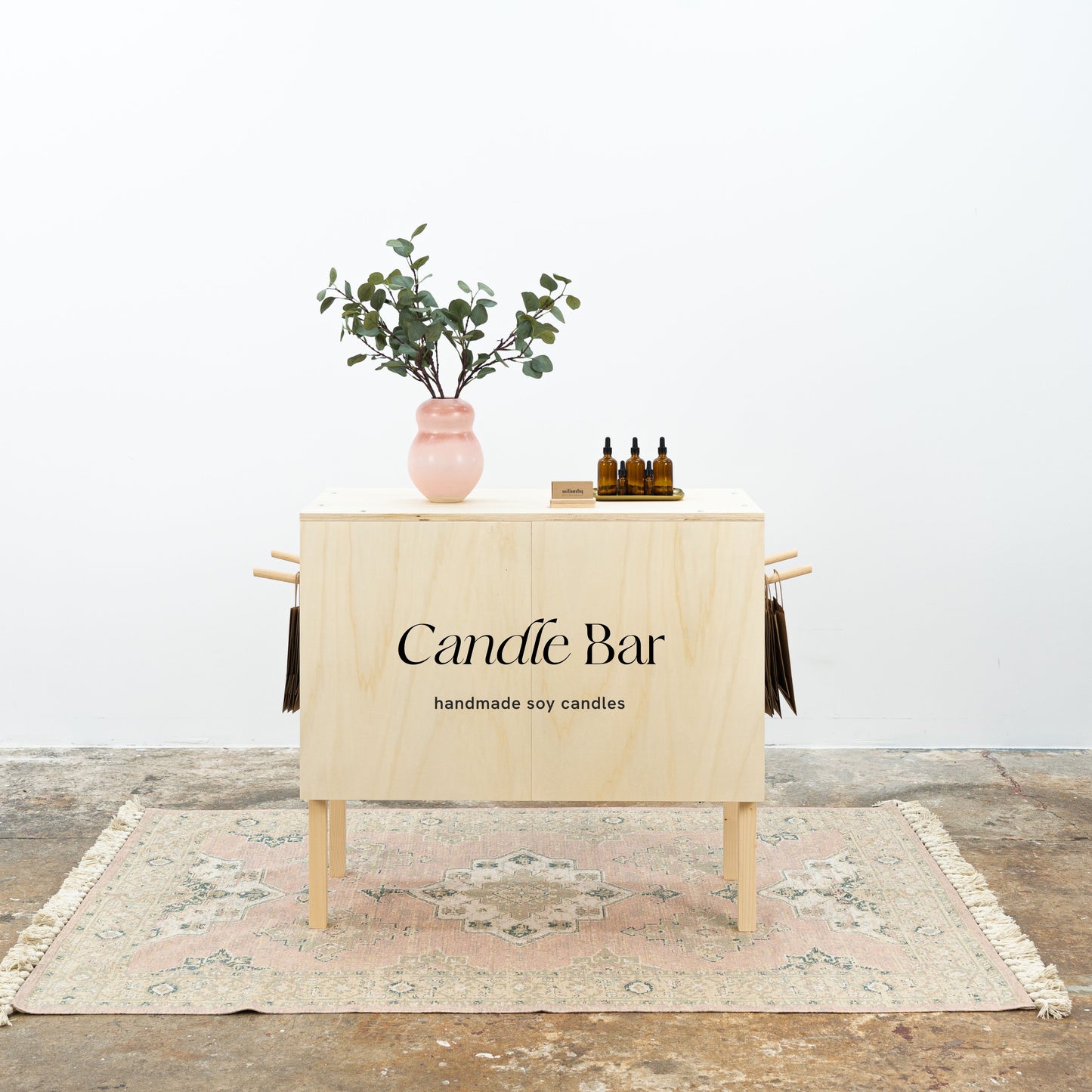 Portable vendor booth with wooden checkout station