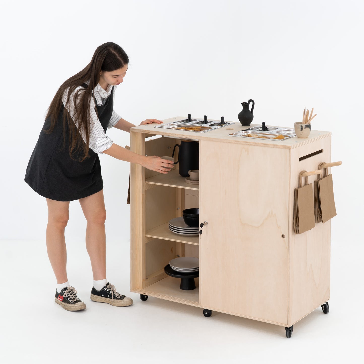 Flat-pack catering station designed for pop-up restaurants and outdoor events