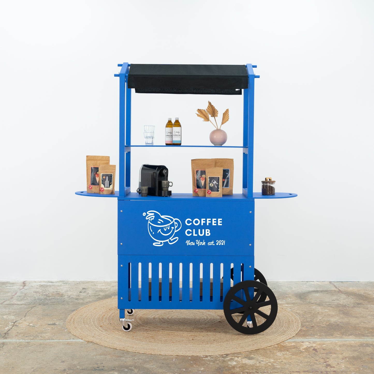 Cobalt blue wooden cart with black awning – Coffee Shop theme