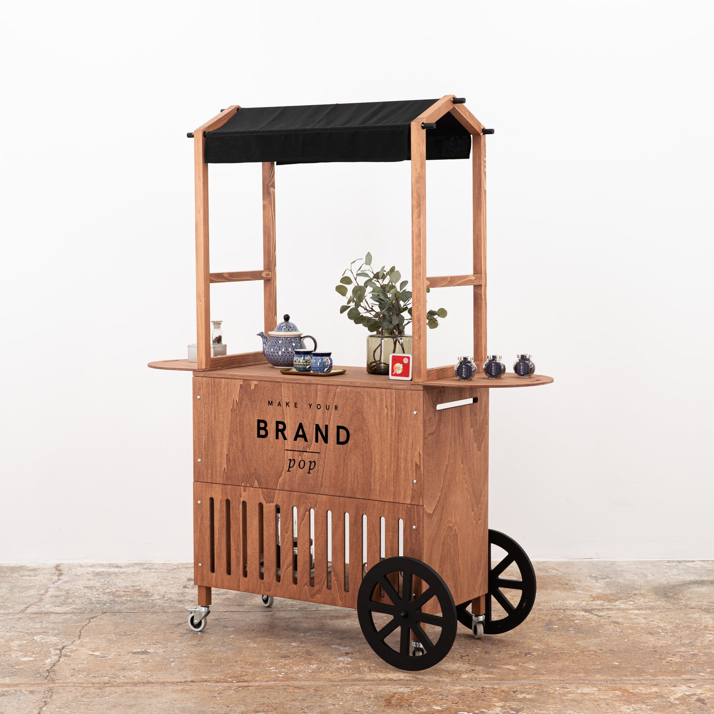 Mobile exhibition cart in deep brown finish with custom branding