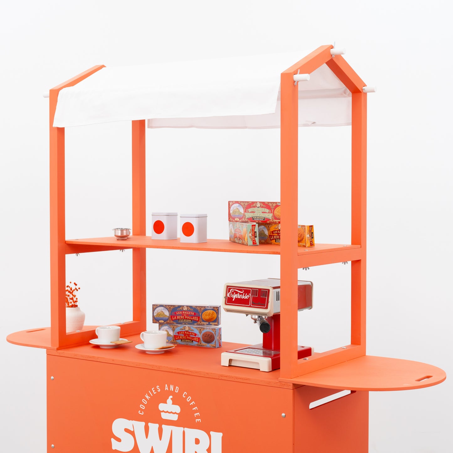 Orange vendor booth with full branding – SWIRL product setup
