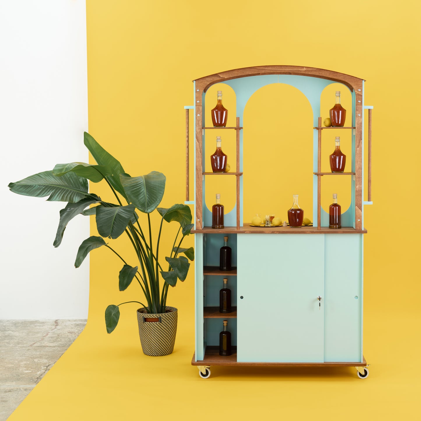 portable merchandising station with arch display and wheels